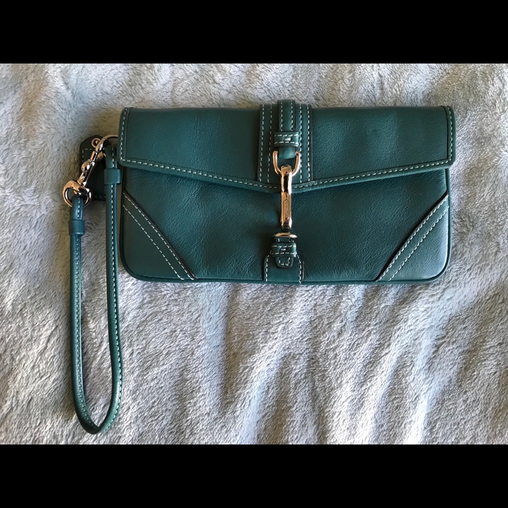 Excellent condition teal Coach wristlet